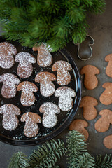 Christmas homemade gingerbread cookies on wooden table