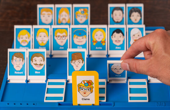 Amsterdam, The Netherlands, 16.07.2025, Gameplay of Retro 1979 &lsquo;Guess Who?&rsquo; Board Game, Classic Two-Player Family Game