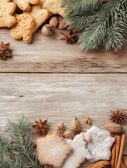 Top view of cozy Christmas composition with cookies, dried oranges, cinnamon sticks, and pine branches on a rustic wooden table. Warm festive background with natural winter mood.
