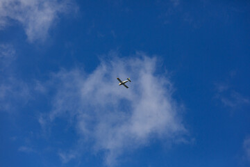 View of plane against sky on summer day, Gdansk, Poland