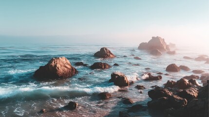 Serene Coastal Landscape with Rocky Shore and Gentle Waves Under a Soft Misty Sky at Dawn, Capturing Nature’s Tranquility and Beauty