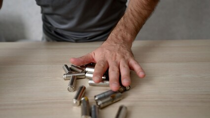 Group of used, corroded and discharged batteries for recycling