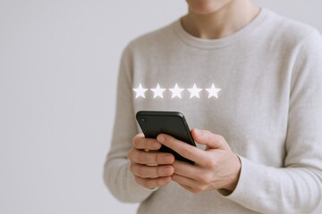 Customer Feedback on Mobile: Man Holds Phone Displaying Five-Star Rating, Showing Online Review Satisfaction