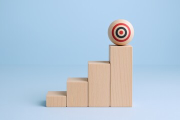 Goal Achievement Visualization: Wooden Blocks Forming Steps Leading to a Target Sphere on Blue Background