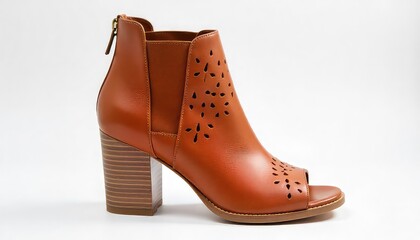 A close up shot of a brown leather peep toe ankle boot with a block heel on a white background