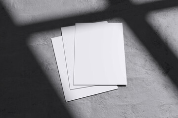 Three white letterhead on concrete background for mockup template