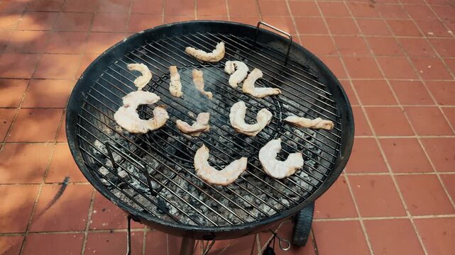 Grilled intestines to crispy texture. Chinchulin is the small intestine of an cow used in cooking, especially in Argentine, Uruguayan, and Paraguayan cuisine. High quality 4k footage