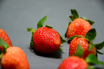 Close up photo of fresh strawberry isolated on gray background