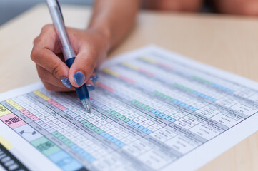 Analyzing data trends business meeting insights office document review professional close-up