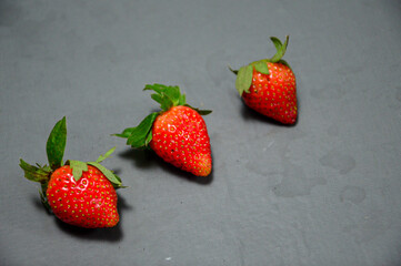 Fresh strawberry isolated on gray background 