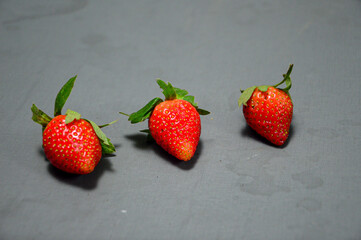 Fresh strawberry isolated on gray background 