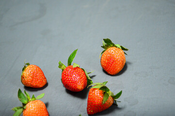 Fresh strawberry isolated on gray background 