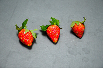 Fresh strawberry isolated on gray background 