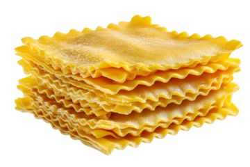Stack of golden ruffled lasagna noodles isolated on black background