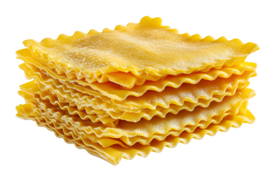 Stack of golden ruffled lasagna noodles isolated on black background