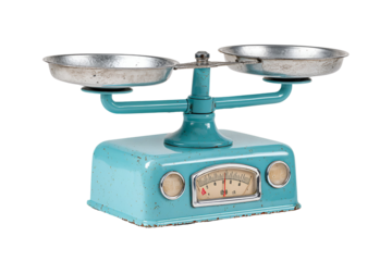 Vintage turquoise kitchen scale with metal bowls on black background