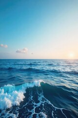 Vast, unbroken expanse of ocean stretching to the horizon under a clear sky Perfect for travel, nature, and serenity themes Calm waves gently roll across the surface , travel, blue, horizon line