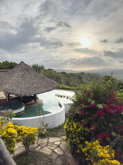 Pool with canopy on green nature background