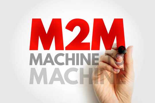 M2M Machine to Machine communication concept with a hand holding a marker. Modern technology automation and digital network connection abbreviation background design