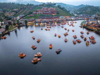 Traditional Chinese-style, tourist boats in dam or lake at Baan, Rak, Thai, Village Mae Hong Son, Thailand.