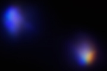 Defocused Blue and Purple Glows on Black Background