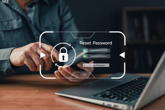 Man using smartphone to reset password with digital security interface, representing cybersecurity, data protection, account recovery, and safe online access concept.