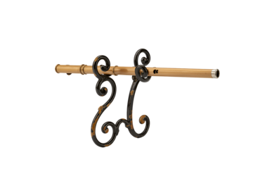 Bamboo flute resting on a decorative metal stand isolated on transparent background