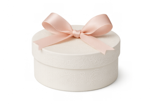 Round white gift box with embossed pattern and pink ribbon bow, celebrating special occasions - Powered by Adobe