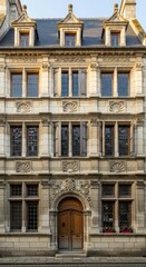 Fototapeta premium Architectural grandeur: Intricate facade of a historic building revealing detailed stonework and