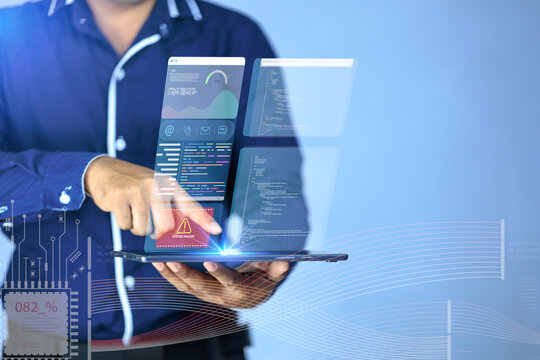 A businessman interacts with a futuristic digital interface,showcasing the application of artificial intelligence (AI) in modern workplaces.This conceptual image represents innovation,data analytics.