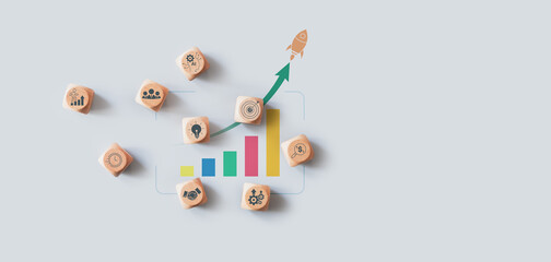 Rocket launching from wood cube with business icon, Start-up, Creativity, Big idea, Business goals management, Investment on new project to wealth, Company strategy target, Sustainable financial plan