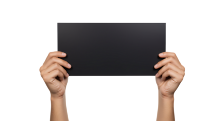 A golden stanchion and red velvet rope lined pathway leading to a red carpet.