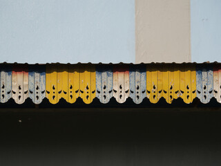 Old and damaged sun and rain awnings