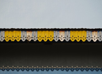 Old and damaged sun and rain awnings