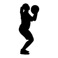 Silhouette of a Woman Basketball Player