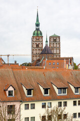 Dormers and cathedral towers. Old town mood.