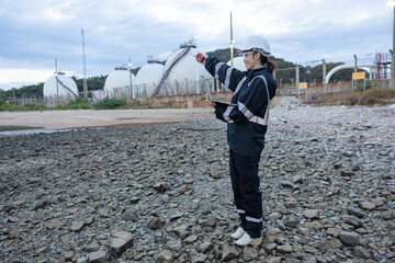 Engineer Monitoring Data at Natural gas plant