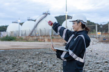 Engineer Monitoring Data at Natural gas plant