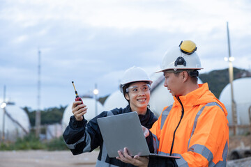 Engineers Discussing Operations at Gas Facility