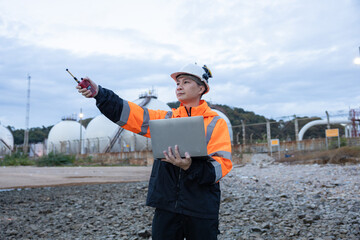 Engineers Conducting Night Inspection at Refinery