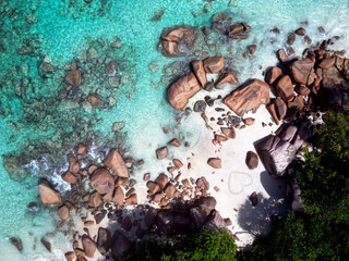 Anse Cocs beach, La Digue Seychelles, tropical beach during a luxury vacation in Seychelles. Tropical beach Anse Cocs beach, La Digue, Praslin, Mahe Seychelles with turqouse colored ocean
