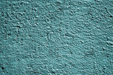 Monochrome grungy concrete background in turquoise for design backgrounds