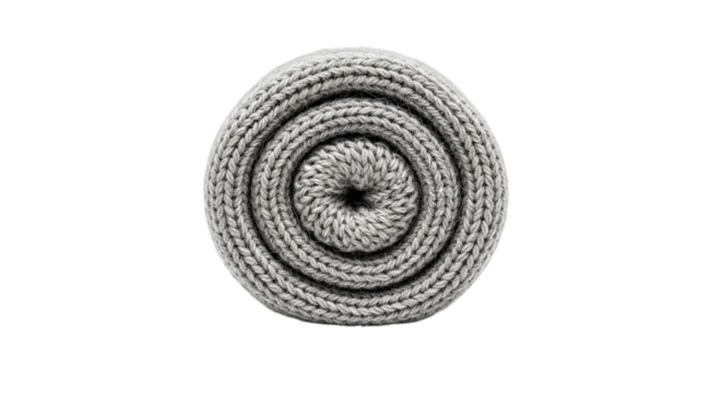 A tightly rolled gray knit blanket, forming a cozy and inviting spiral shape, perfect for warmth and comfort