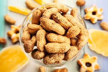 peanuts bowl on wood background