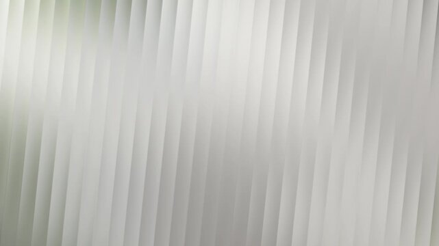 Abstract background of vertical light gray blinds with subtle green hue on the left side, creating a soft, modern texture