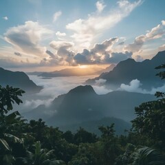 A breathtaking sunrise over misty tropical mountains, golden sunlight shining through clouds and illuminating the lush green valley below. Perfect for nature, travel, adventure, and landscape concepts