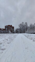 Track at snowed stadium of city park