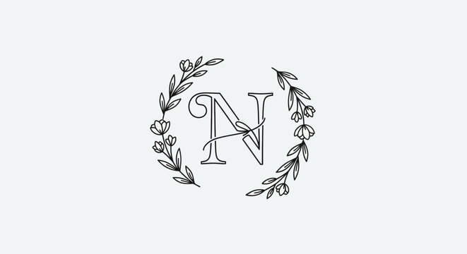 Elegant initial letter N surrounded by a delicate floral wreath for sophisticated designs - Powered by Adobe