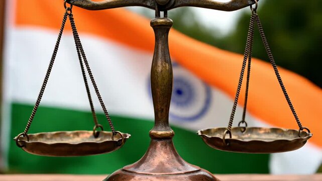 Scales of justice with indian flag in the background symbolic representation neutral lighting