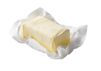 Butter block in white paper wrapper isolated on a transparent background